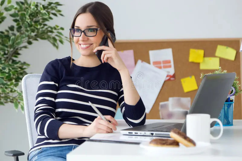 files/confident-young-woman-working-her-office-mobile-phone-portrait-54932698_7989bac3-7779-4beb-a192-b894e9ed2474.webp