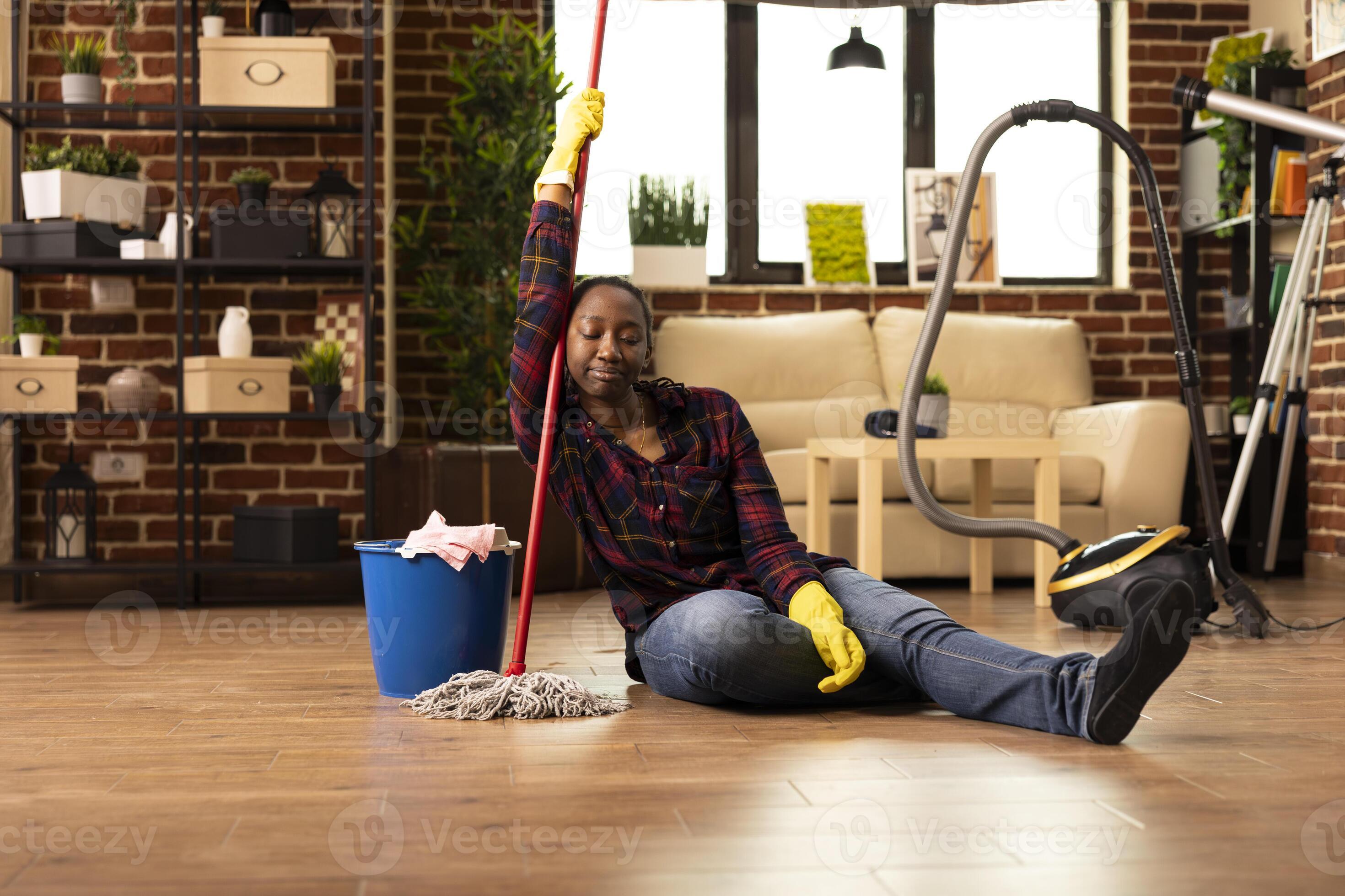files/exhausted-woman-sits-on-floor-with-mop-after-cleaning-showing-fatigue-from-household-chores-black.jpg